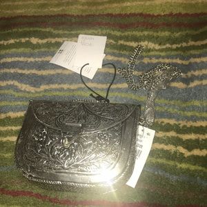 From St Xavier Riley Clutch